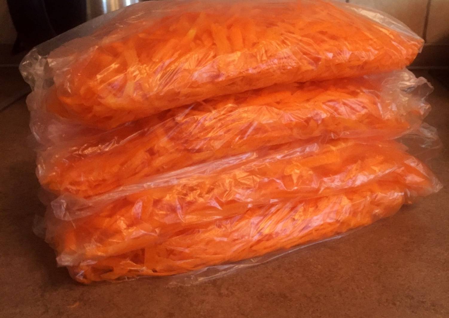 Натертая замороженная морковь