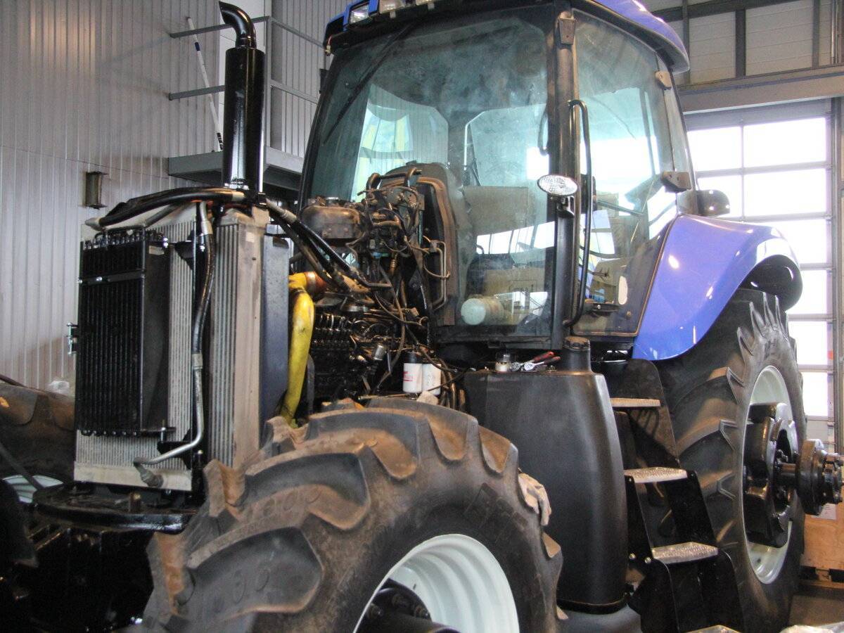Нью холланд (ньюхолонд, new holland) трактор – модельный ряд и страна производитель