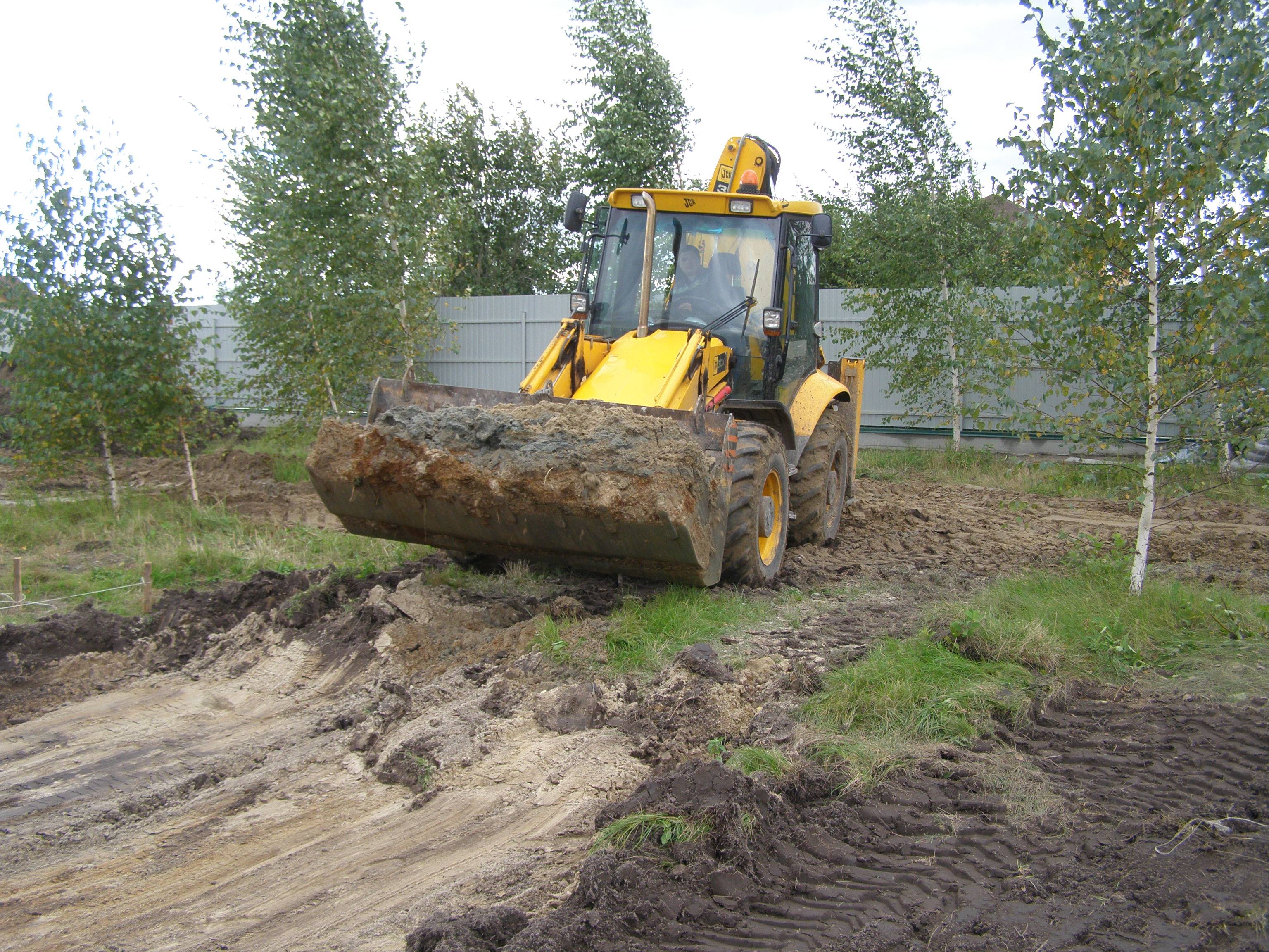 Разравнивание грунта JCB 3cx